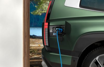 The open charging socket of Hyundai IONIQ 9 electric SUV with charging cable.
