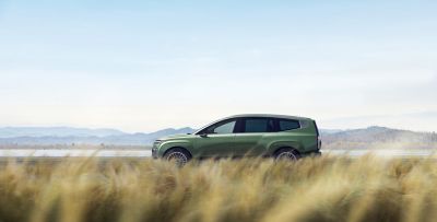 Hyundai IONIQ 9 driving on the road.