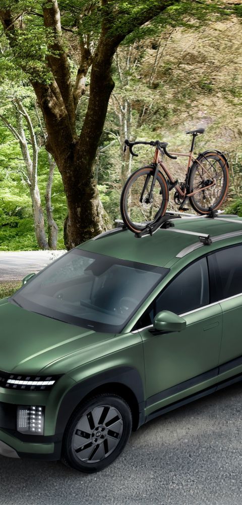 Hyundai IONIQ 9 with cross bars aluminium and bike carrier plus transport accessories.