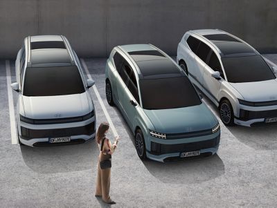 Three Hyundai IONIQ 9 cars parked in a row.