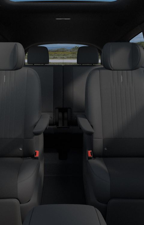 2nd row Swiveling seats facing the 3rd row inside the Hyundai IONIQ 9 electric SUV Calligraphy Black Ink trim.