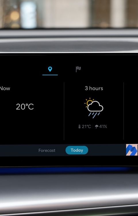 Hyundai IONIQ 9 interior display showing live weather forecast and location-based information.
