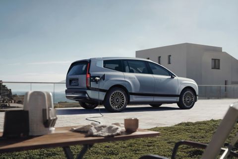 Hyundai IONIQ 9’s Vehicle-to-Load technology powering a coffee maker at a camp site.