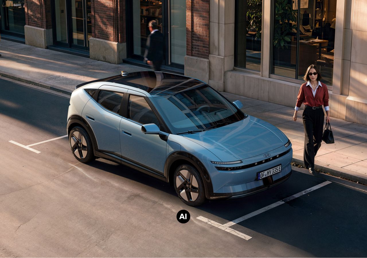 Bild einer Band, die Musikinstrumente in einen roten Hyundai IONIQ 3 N Line lädt.