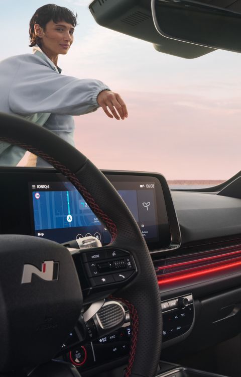 Sporty red accents inside the cockpit of the Hyundai IONIQ 6 N Line electric sedan.