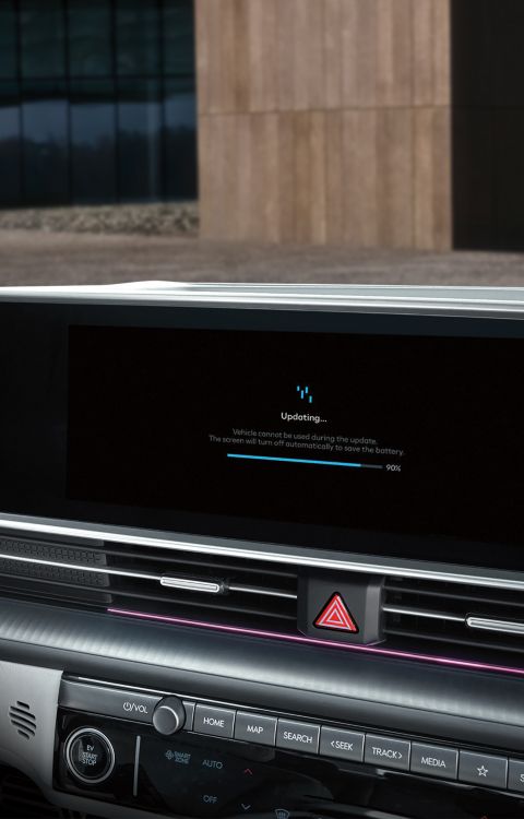 The centre touchscreen inside the IONIQ 6 showing an Over The Air vehicle software update in progress.