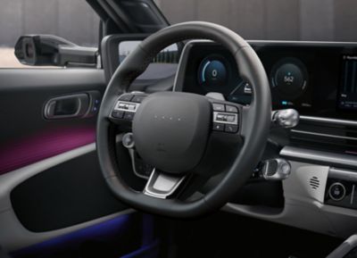 The interactive steering wheel inside the new Hyundai IONIQ 6 electric sedan.