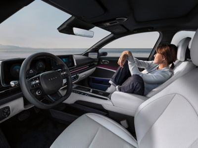 Hyundai IONIQ 6 front seats displaying a spacious and clean interior design.