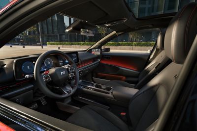 The sporty interior of the new Hyundai IONIQ 6 N Line seen from driver's door.
