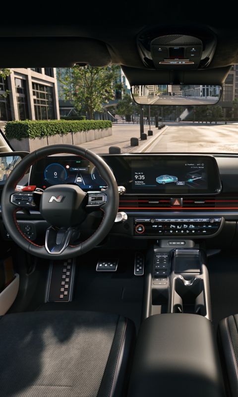 The sporty interior of the new Hyundai IONIQ 6 N Line seen from the rear seats.