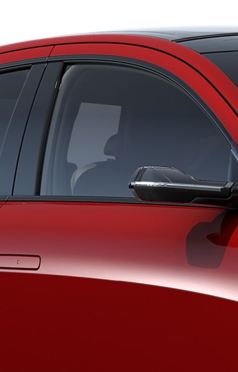 Glossy black mirror caps on a red Hyundai IONIQ 6 N Line electric sedan.