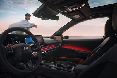 Sporty red accents inside the cockpit of the Hyundai IONIQ 6 N Line electric sedan.