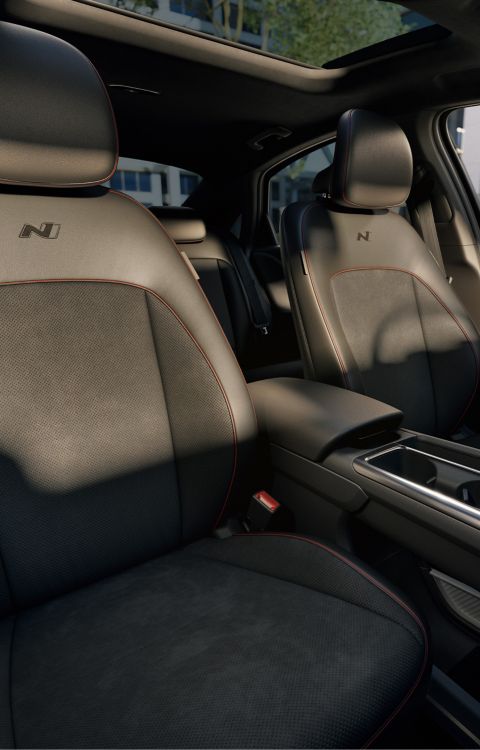 N Line sport seats inside a Hyundai IONIQ 6 N Line electric sedan.