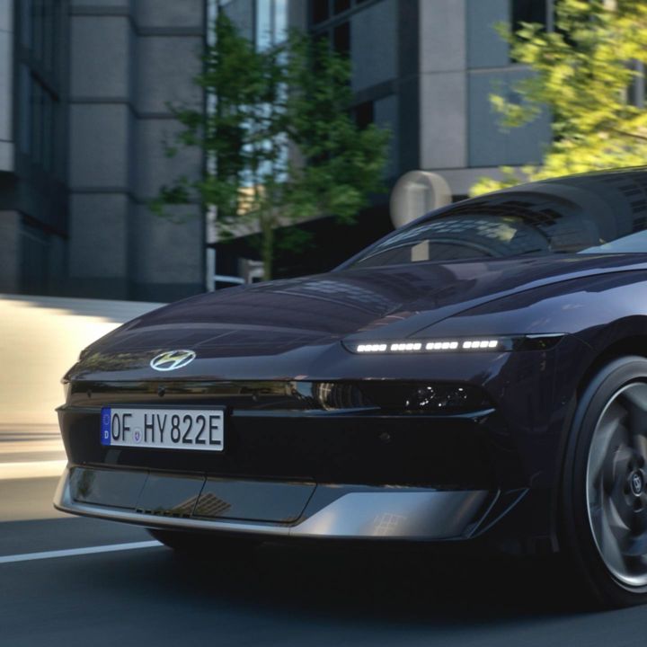 Video of the Hyundai IONIQ 6 electric sedan driving on city streets. 
