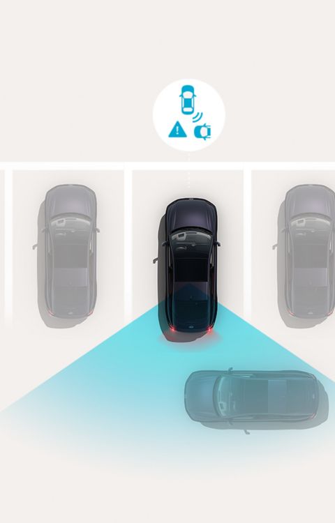 Rear Cross-Traffic Collision-Avoidance Assist: Hyundai IONIQ 6 brakes while reversing as sensors detect an approaching vehicle.
