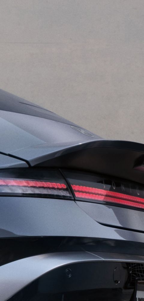 Hyundai IONIQ 6 rear view showing integrated spoiler and horizontal light bar