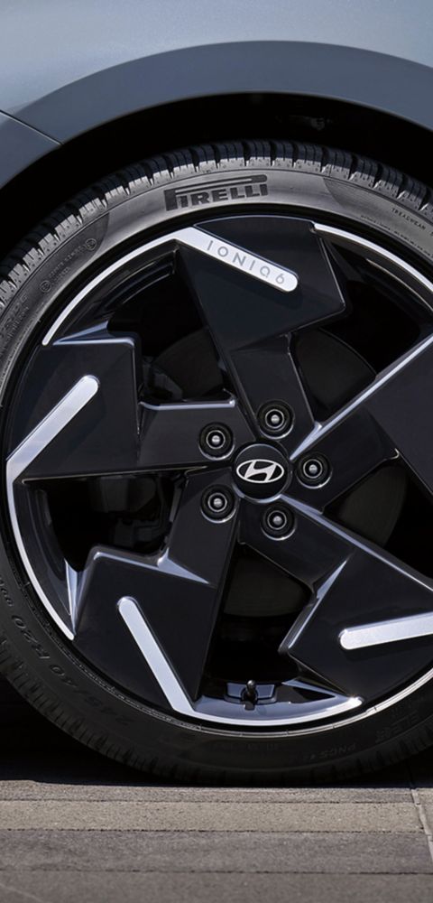 Hyundai IONIQ 6 close-up of aerodynamic alloy wheel and tyre design