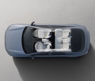 The new IONIQ 6 shown from above x-ray view through roof with 7-airbags visible. 