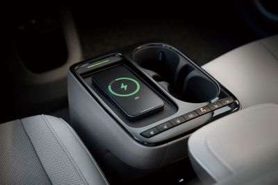 The high-speed wireless charger port in the centre console of the Hyundai IONIQ 5.