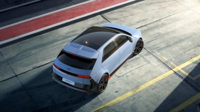 Overhead view of the all-electric Hyundai IONIQ 5 N with a panoramic glass roof.