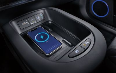 High-speed wireless charger port charging a phone in the Hyundai IONIQ 5 N. 