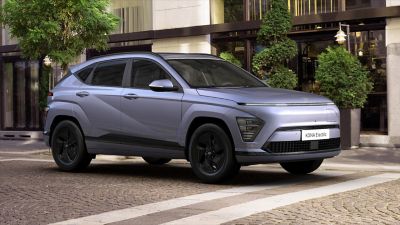 KONA Black Package in front of building