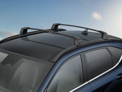 Two roof racks railings attached to the roof of the Hyundai KONA Electric.