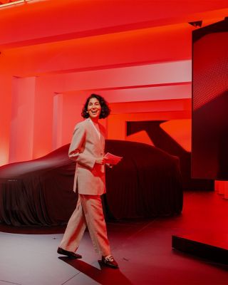 Hyundai exhibition installation with covered vehicle and presentation space at Milan Design Week