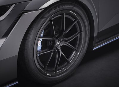 Hyundai IONIQ 5 N NPX1 features hybrid carbon wheels with blue calipers featuring the N logo.