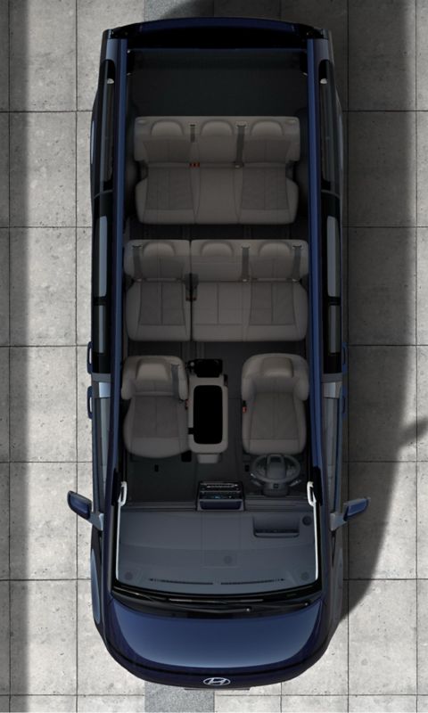 Hyundai STARIA Electric top-down view showing 9-seater layout and spacious interior cabin.