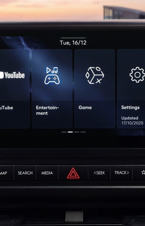 Hyundai STARIA Electric infotainment touchscreen showing entertainment and settings menus.