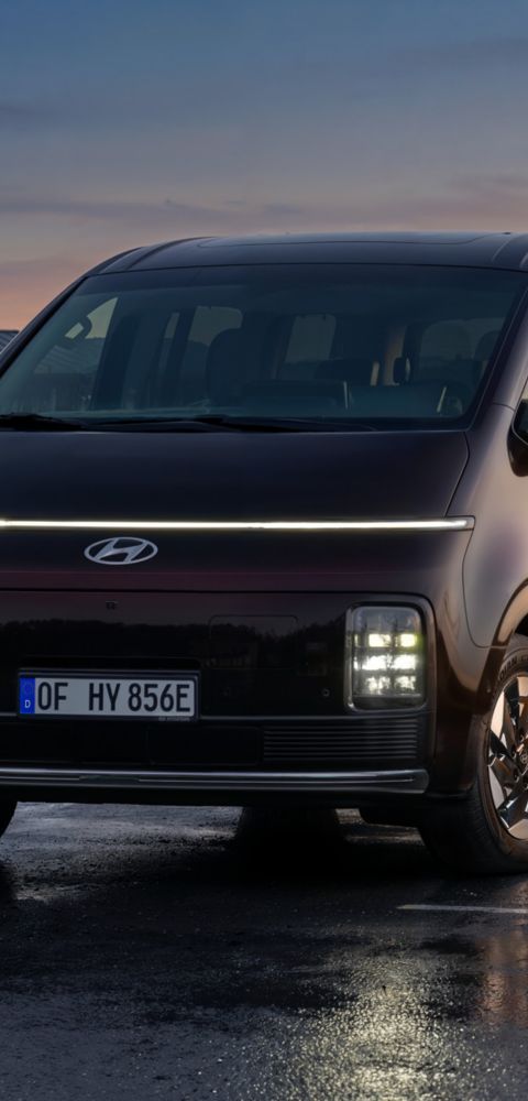 Hyundai Staria Electric front view at sunset.