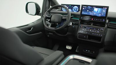 Driver-focused cockpit of the STARIA Electric with digital displays and intuitive controls.