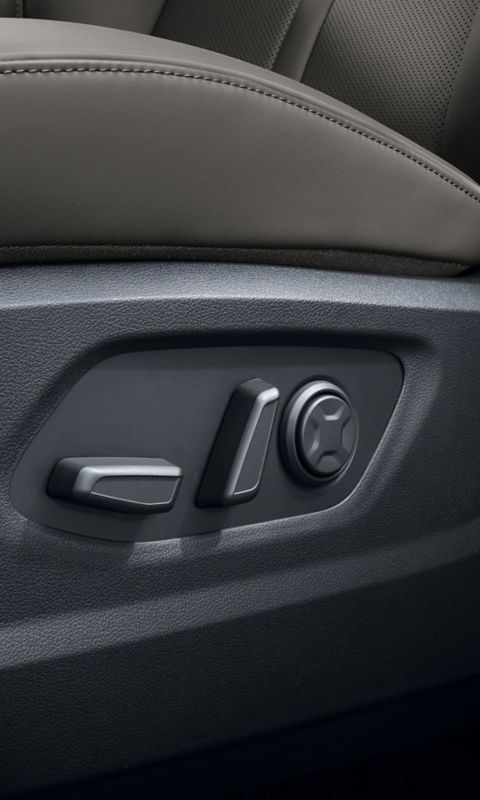  Close-up of Hyundai STARIA Electric seat controls for adjusting position and comfort.