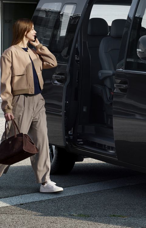 Hyundai STARIA Electric with sliding door open for easy access to spacious interior seating.