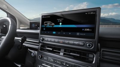Hyundai STARIA Electric featuring cloud-connected EV routing on the curved display.