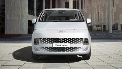 View of the STARIA Hybrid Van’s futuristic front end.