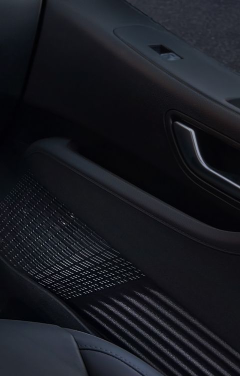 Close-up of the Hyundai STARIA Electric interior with decorative speaker panel details.