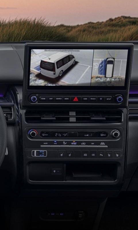 Hyundai STARIA Electric dashboard showcasing dual screens and a steering wheel.