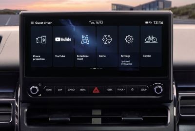 Hyundai STARIA Electric infotainment touchscreen showing entertainment and settings menus.