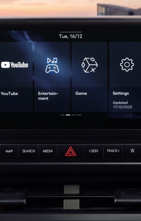 Hyundai STARIA Electric infotainment touchscreen showing entertainment and settings menus.