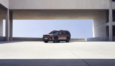 The Hyundai SANTA FE standing on a parking deck.