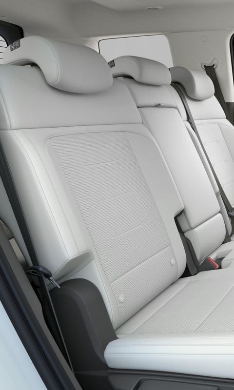 Full Hyundai STARIA Electric interior view showing driver and passenger area at sunset.