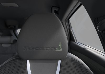 Front headrest with 20th anniversary logo in the Hyundai TUCSON 20th Anniversary Edition.