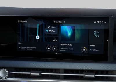 Ekran centralny Hyundaia TUCSON Hybrid pokazujący połączenie Bluetooth. 