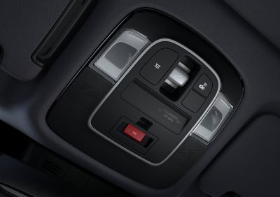 Le bouton eCall à l'intérieur du Hyundai TUCSON Plug-in Hybrid.