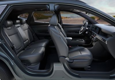 Comfortable five seats of the Hyundai TUCSON Plug-in Hybrid pictured from the side. 