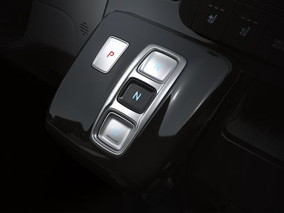 A close-up view of the Hyundai STARIA Hybrid's shift-by-wire button-type controls.