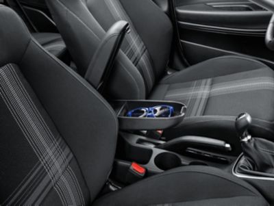 The Hyundai BAYON interior with the adjustable armrest with storage box.