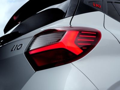 A close-up of the right rear backlight with a logo visible of the Hyundai i10.
